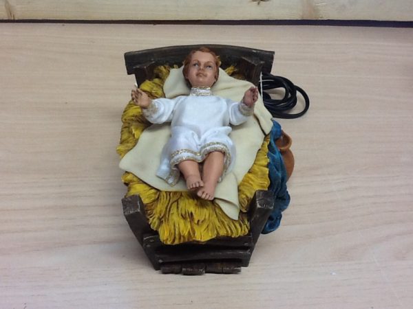 Bambin Gesù per natività cm.28 .in movimento,muove le braccia e alza il capo.rifinito a mano vestiti in stoffa