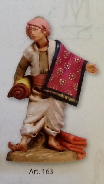 Pastore "venditore di tappeti"realizzato in resina colorata e rifinita a mano per presepe da cm 12