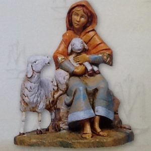 Pastorello con pecore realizzato in resina colorata e rifinita a mano per presepe da cm 12