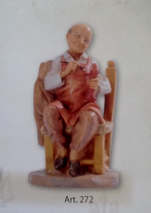 Pastore"scultore" realizzato in resina colorata e rifinita a mano per presepe da cm 12