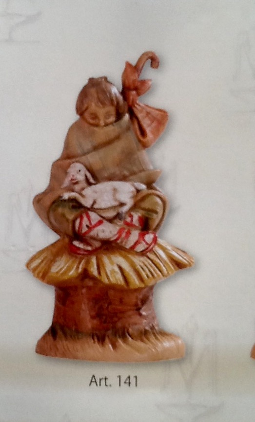 Statuina donna seduta con pecora realizzato in resina colorata e rifinita a mano per presepe da cm 12